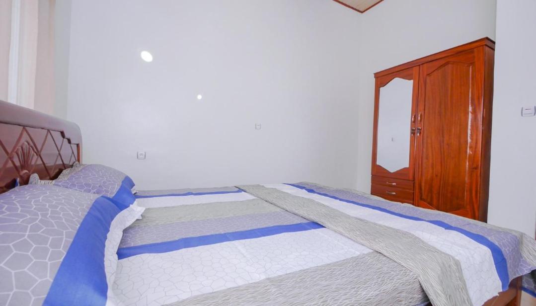 Bed and Breakfast Da Vinci House Кигали Экстерьер фото